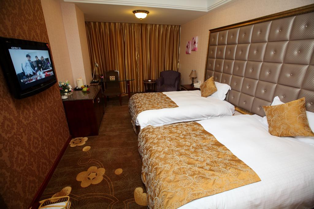 Qingdao Sanfod Hotel Habitación foto
