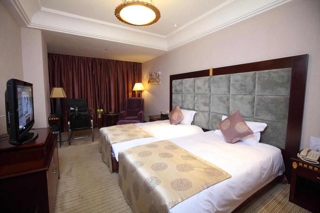 Qingdao Sanfod Hotel Habitación foto