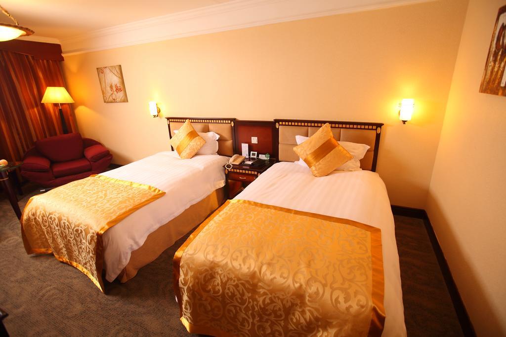 Qingdao Sanfod Hotel Habitación foto