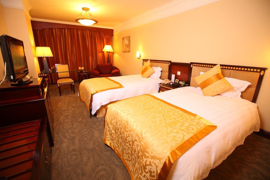 Qingdao Sanfod Hotel Habitación foto