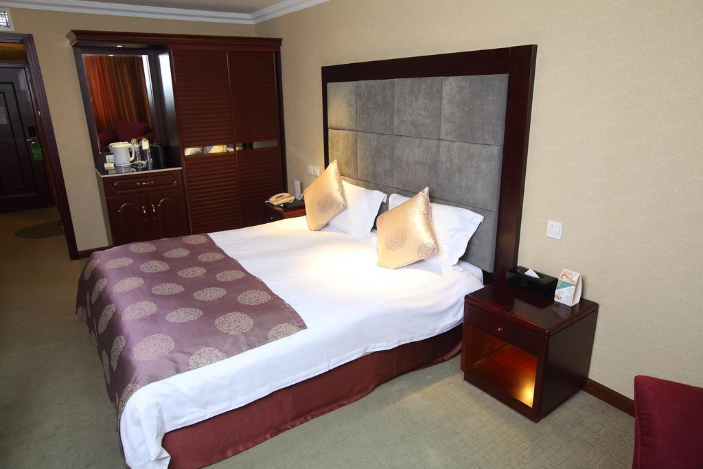 Qingdao Sanfod Hotel Habitación foto