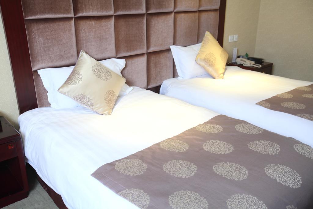 Qingdao Sanfod Hotel Habitación foto