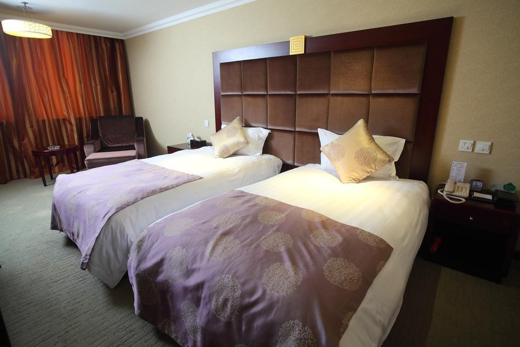 Qingdao Sanfod Hotel Habitación foto