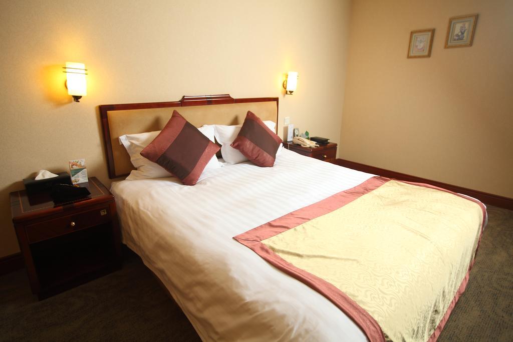 Qingdao Sanfod Hotel Habitación foto