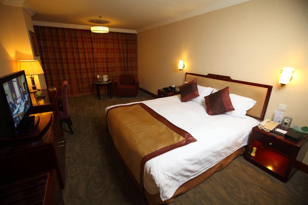 Qingdao Sanfod Hotel Habitación foto