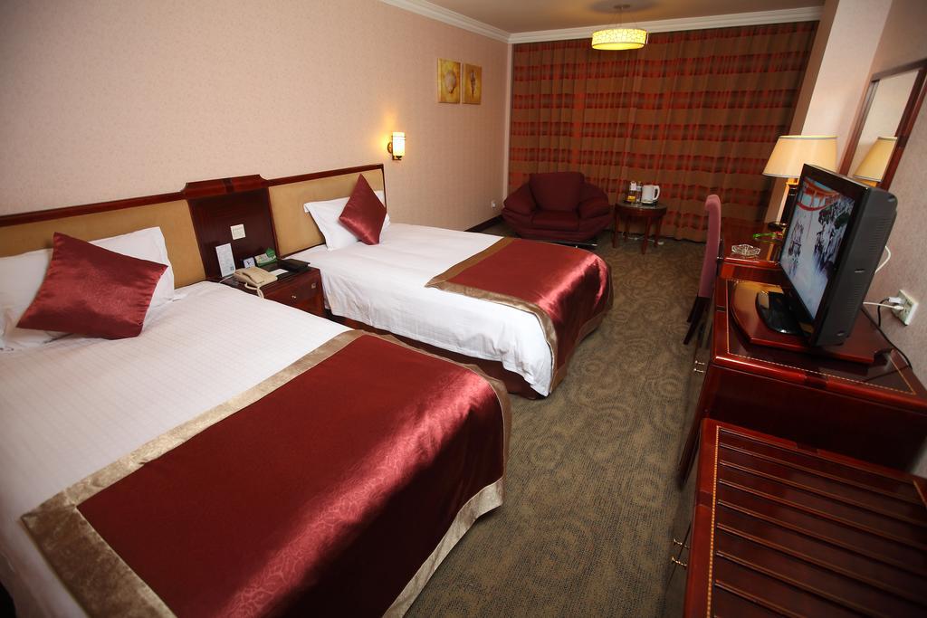 Qingdao Sanfod Hotel Habitación foto